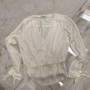 Beautiful Guess cream blouse.